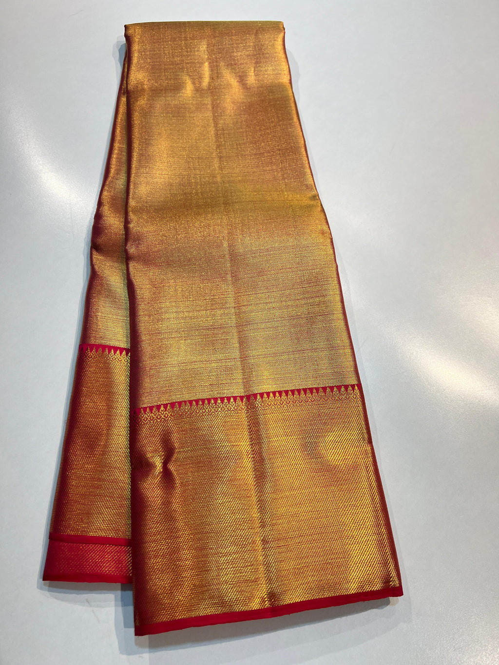 Pure Kanchipuram Handloom Gold Tissue Silk Saree with Pink Salvage.