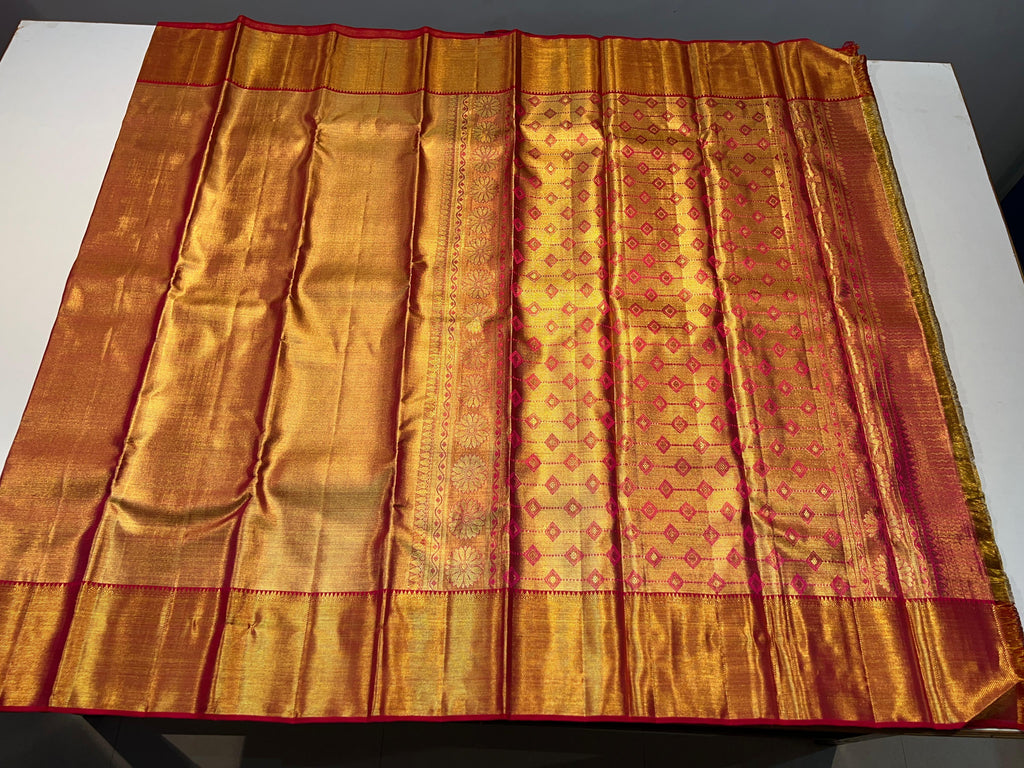 Pure Kanchipuram Handloom Gold Tissue Silk Saree with Pink Salvage.