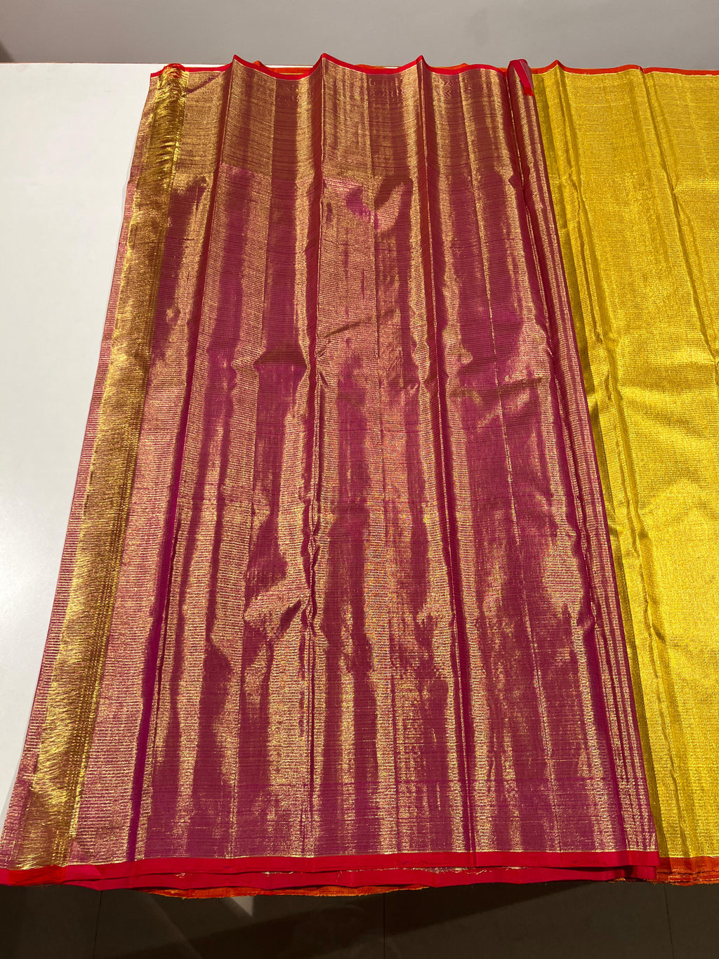 Pure Kanchipuram Handloom Tissue Silk Saree with Gold Zari.