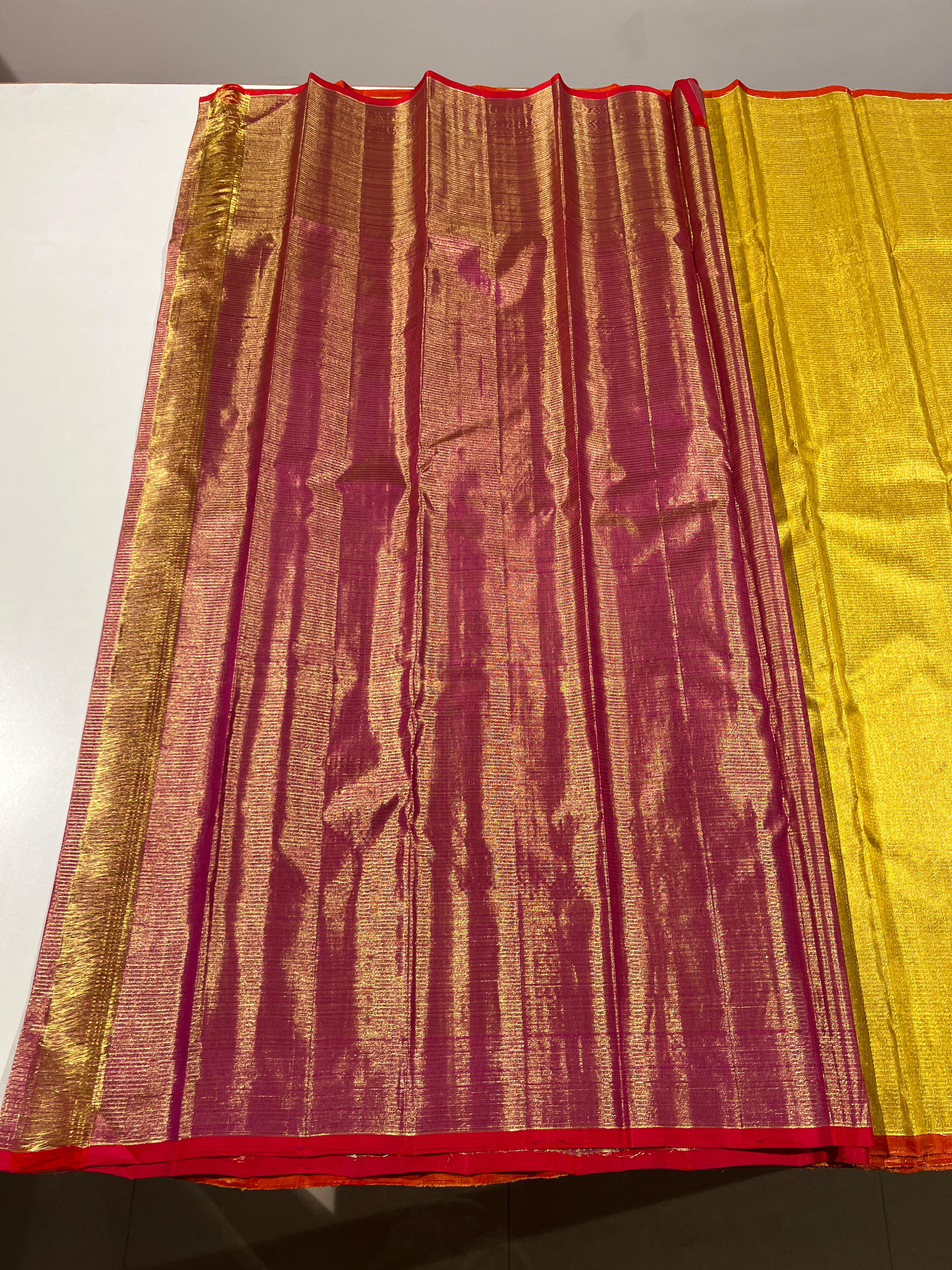 Pure Kanchipuram Handloom Tissue Silk Saree with Gold Zari.