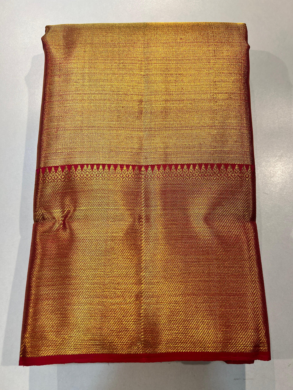 Pure Kanchipuram Handloom Gold Tissue Silk Saree with Pink Salvage.