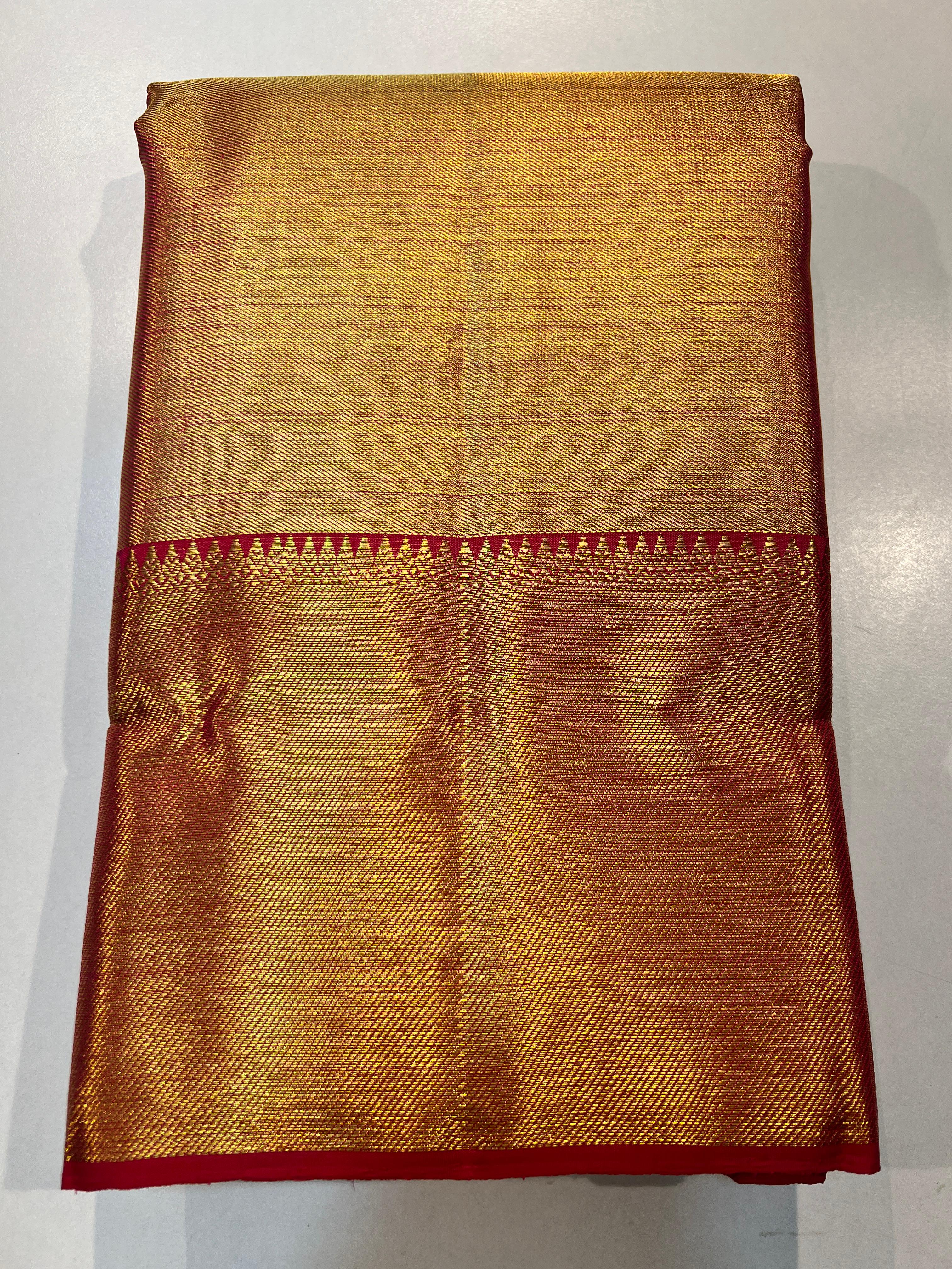 Pure Kanchipuram Handloom Gold Tissue Silk Saree with Pink Salvage.