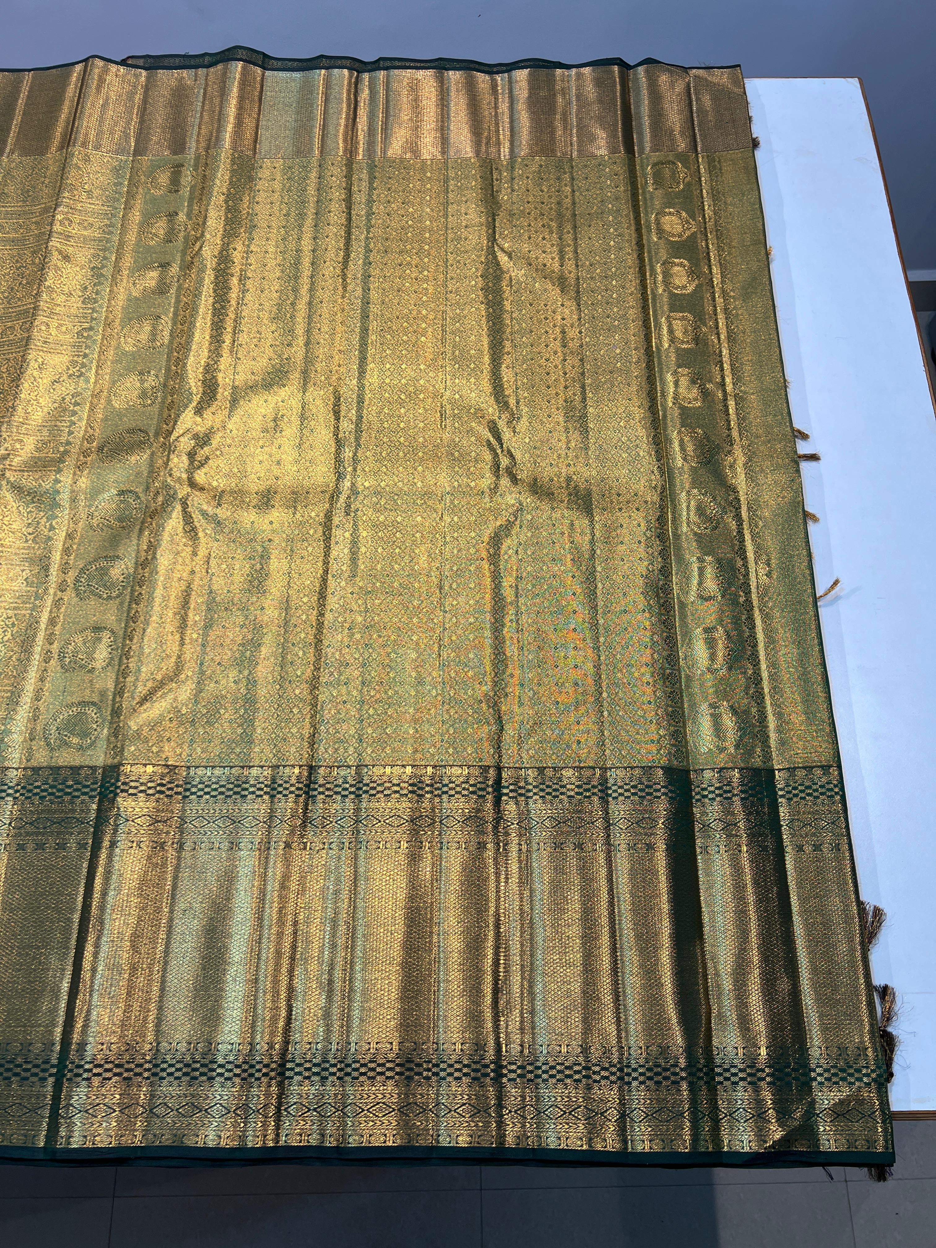 Pure Kanchipuram Handloom Tissue Silk Saree with Gold Zari.