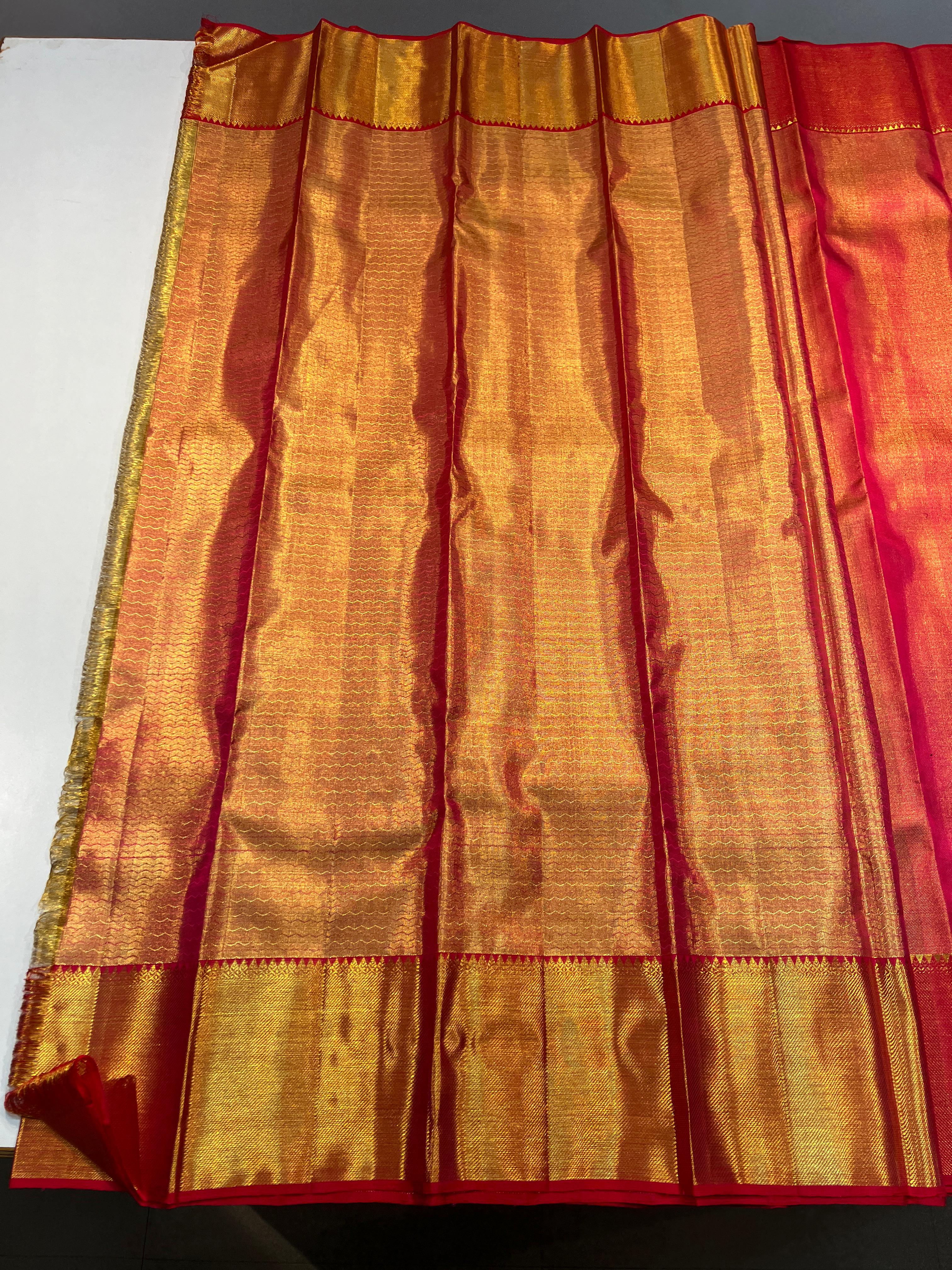 Pure Kanchipuram Handloom Gold Tissue Silk Saree with Pink Salvage.