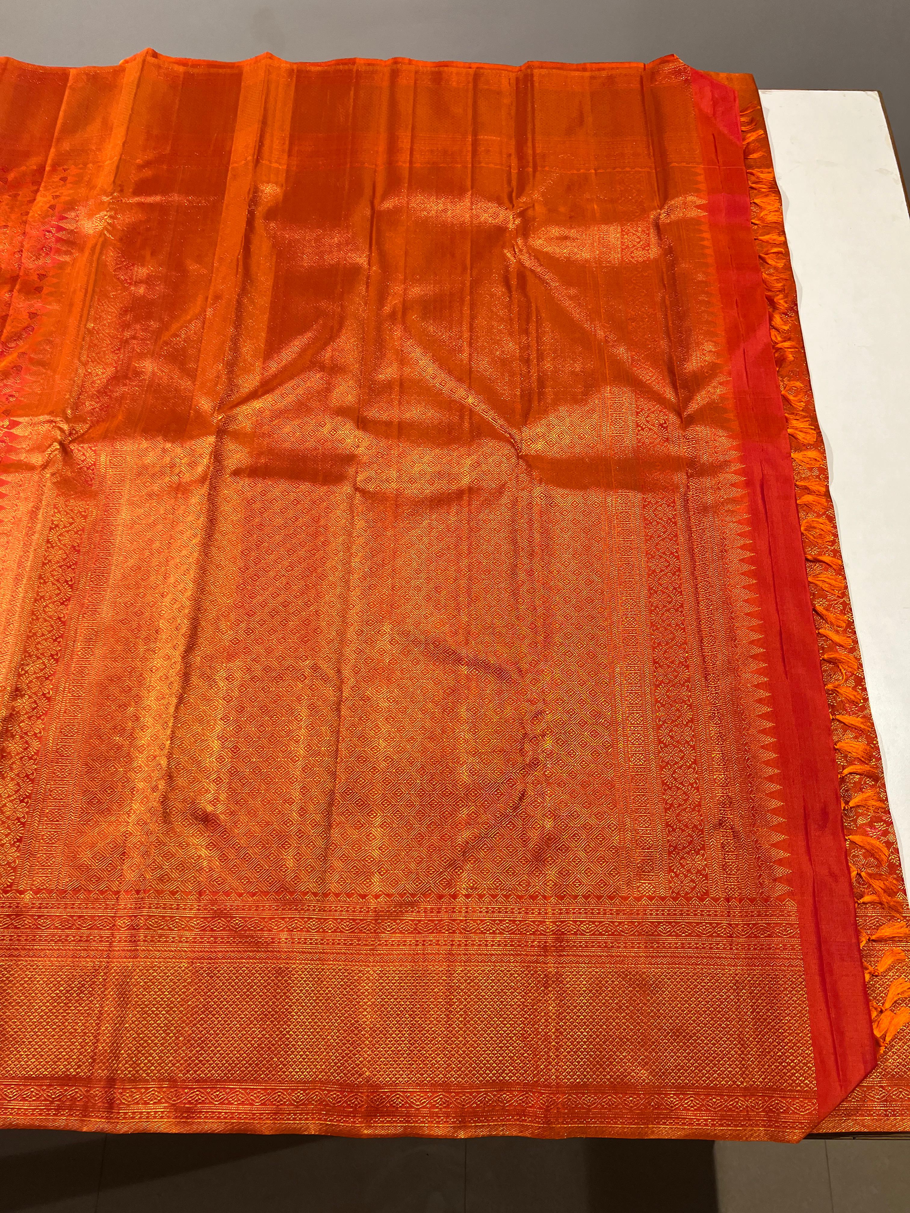 Pure Kanchipuram Handloom Silk Saree in Orange Colour.