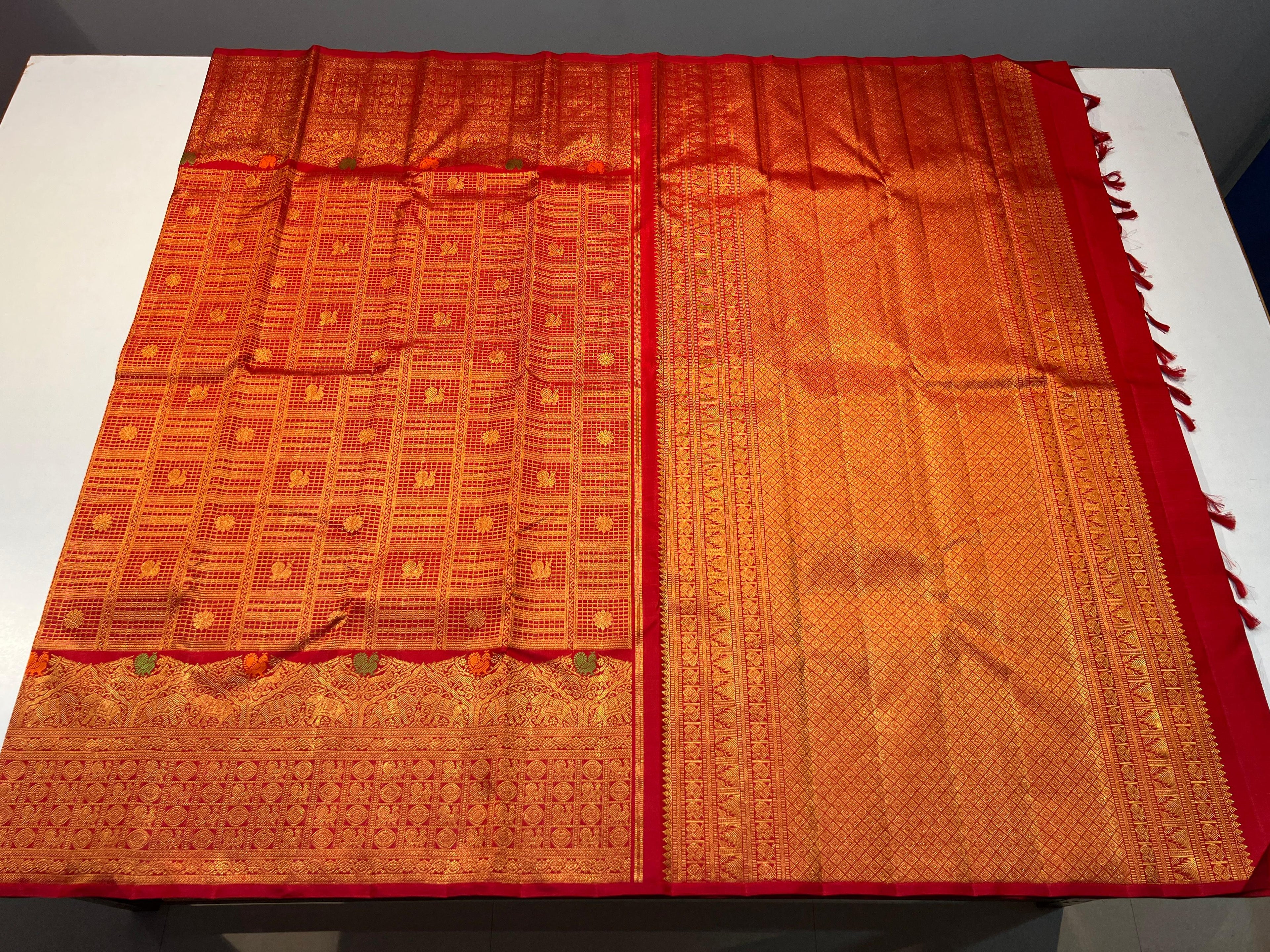 Pure Kanchipuram Handloom Silk Saree with Turning Border.