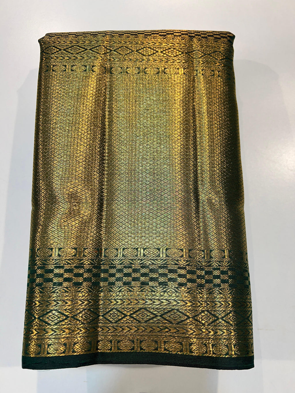 Pure Kanchipuram Handloom Tissue Silk Saree with Gold Zari.