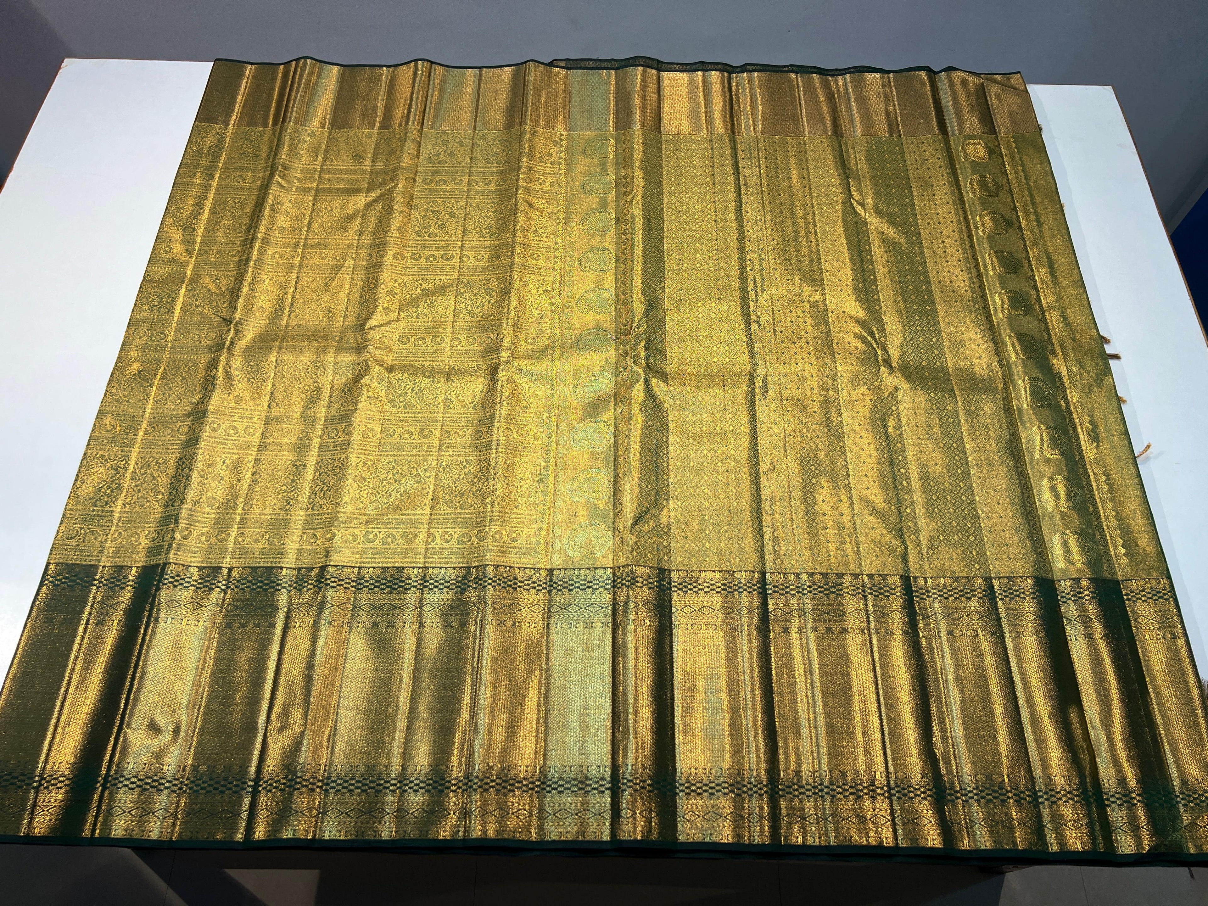 Pure Kanchipuram Handloom Tissue Silk Saree with Gold Zari.