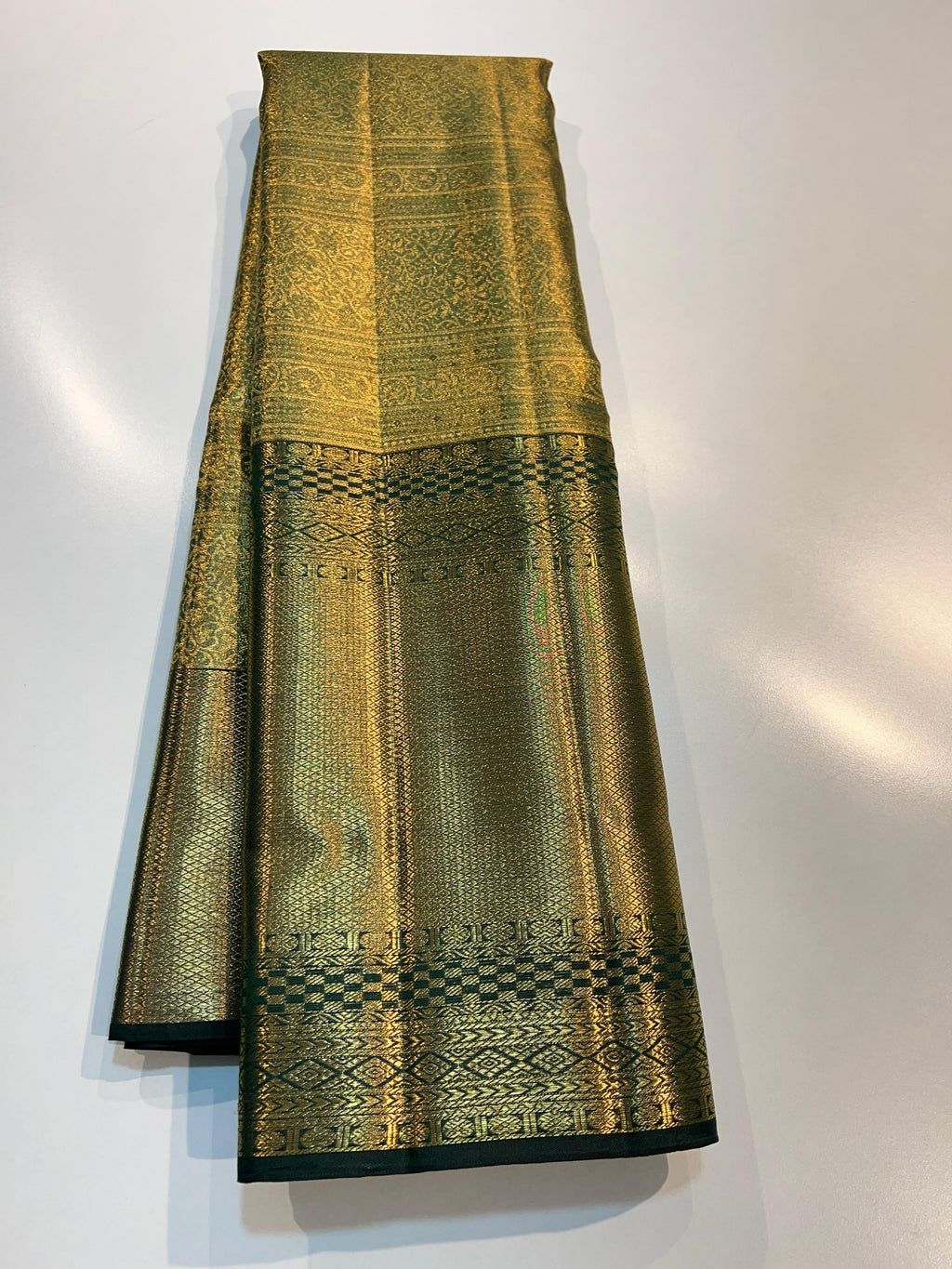 Pure Kanchipuram Handloom Tissue Silk Saree with Gold Zari.