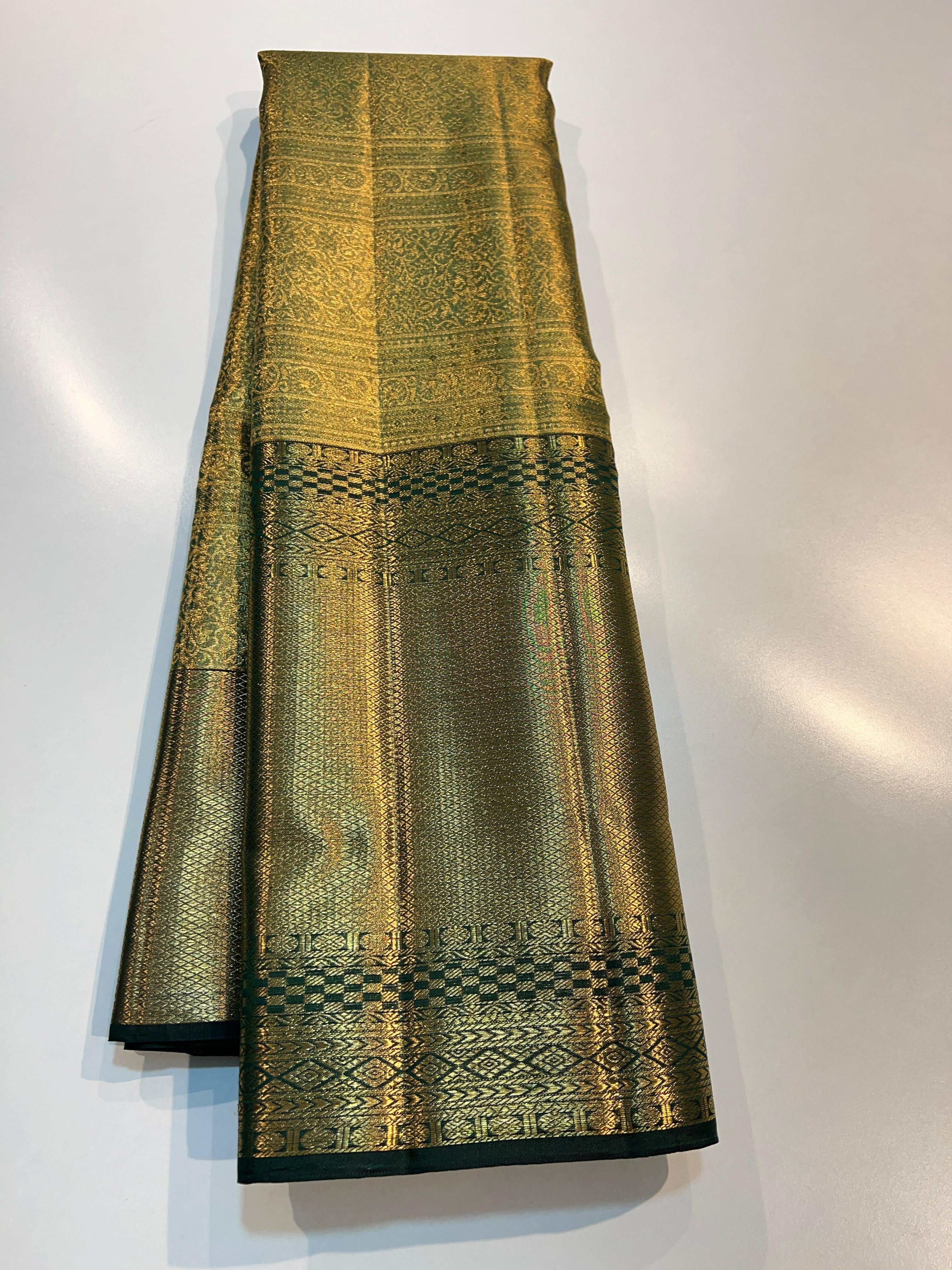 Pure Kanchipuram Handloom Tissue Silk Saree with Gold Zari.