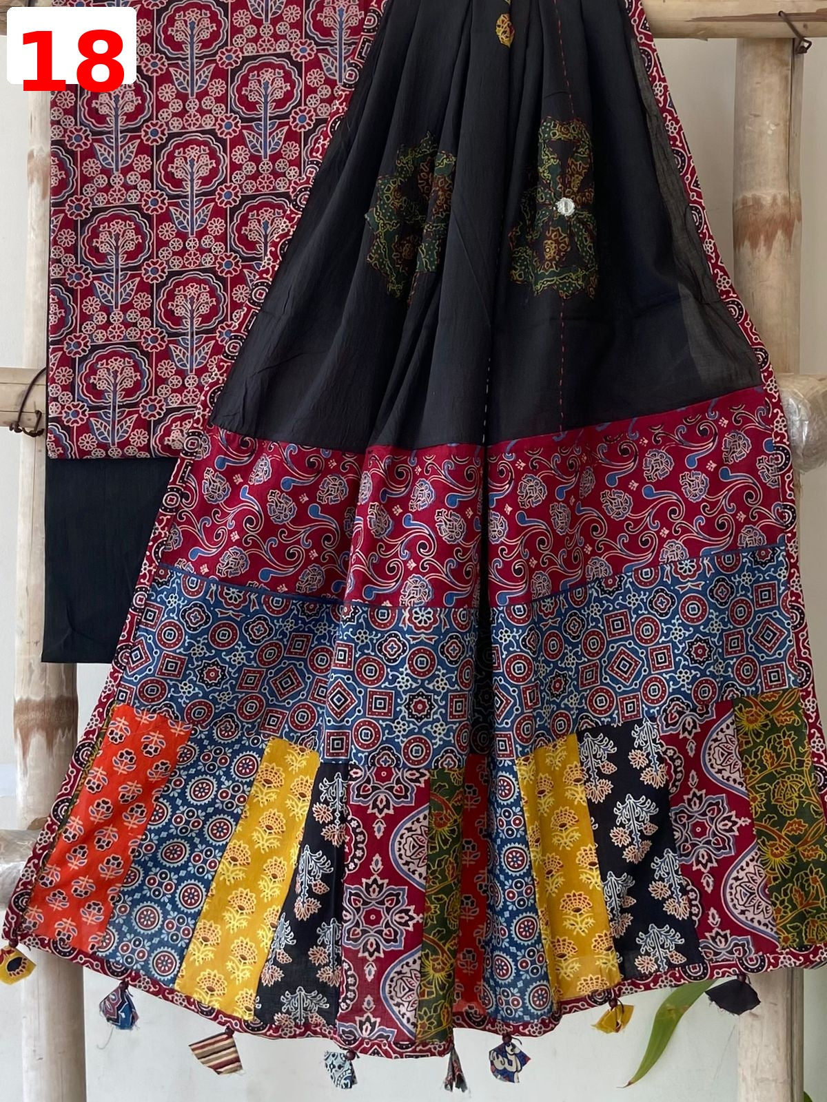 Exclusive Patchwork Ajrakh Cotton Suit Set with Hand Appliqué Mirror Work Dupatta