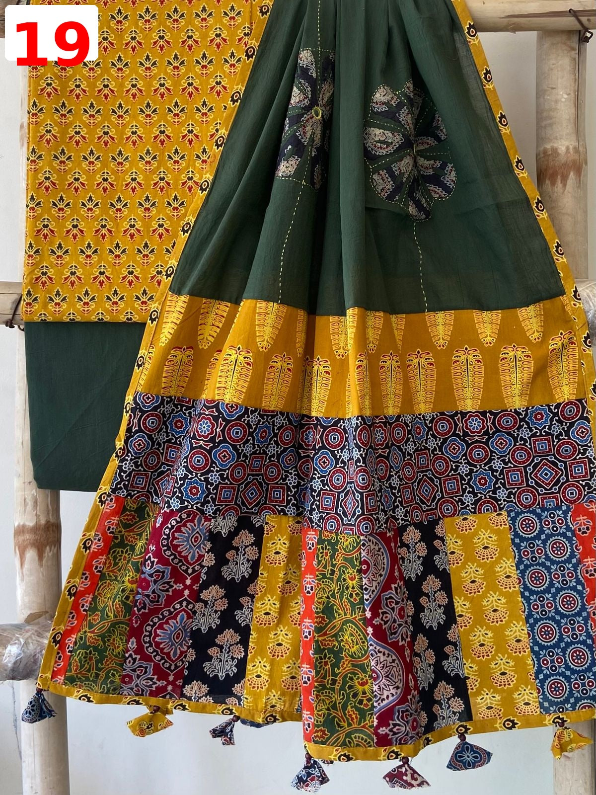 Exclusive Patchwork Ajrakh Cotton Suit Set with Hand Appliqué Mirror Work Dupatta