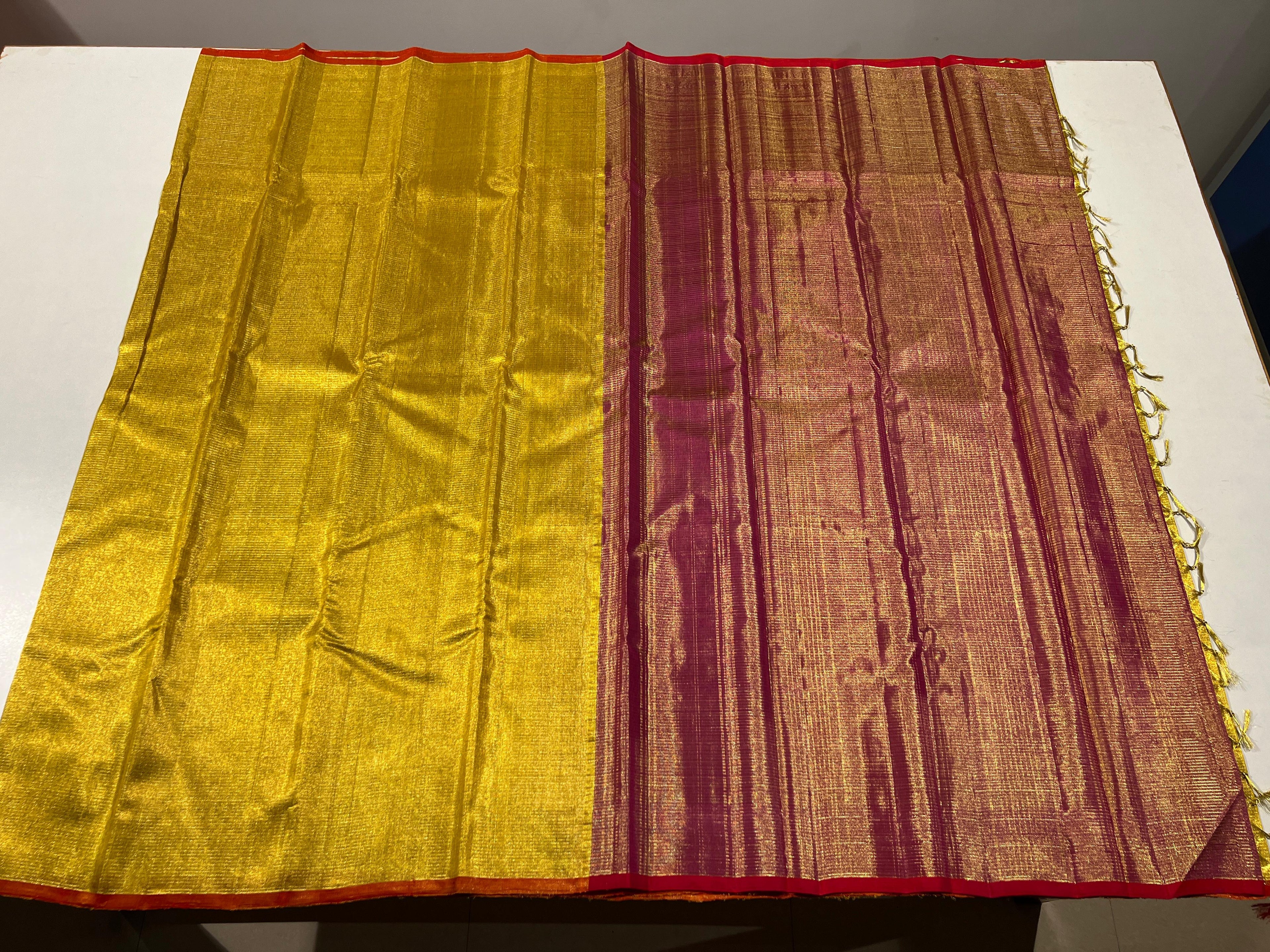 Pure Kanchipuram Handloom Tissue Silk Saree with Gold Zari.