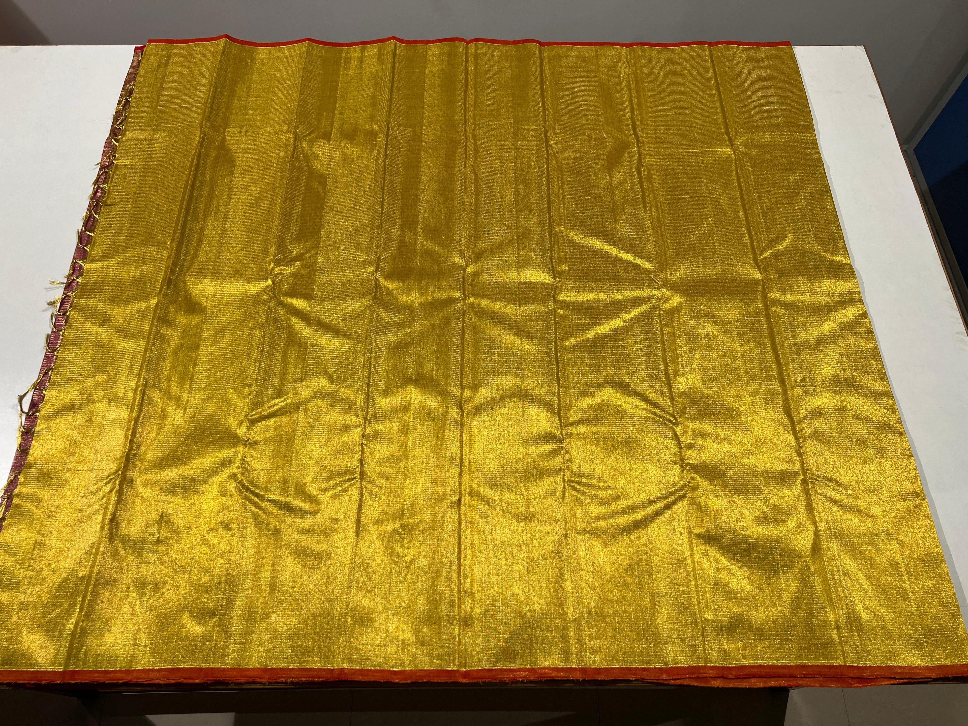 Pure Kanchipuram Handloom Tissue Silk Saree with Gold Zari.