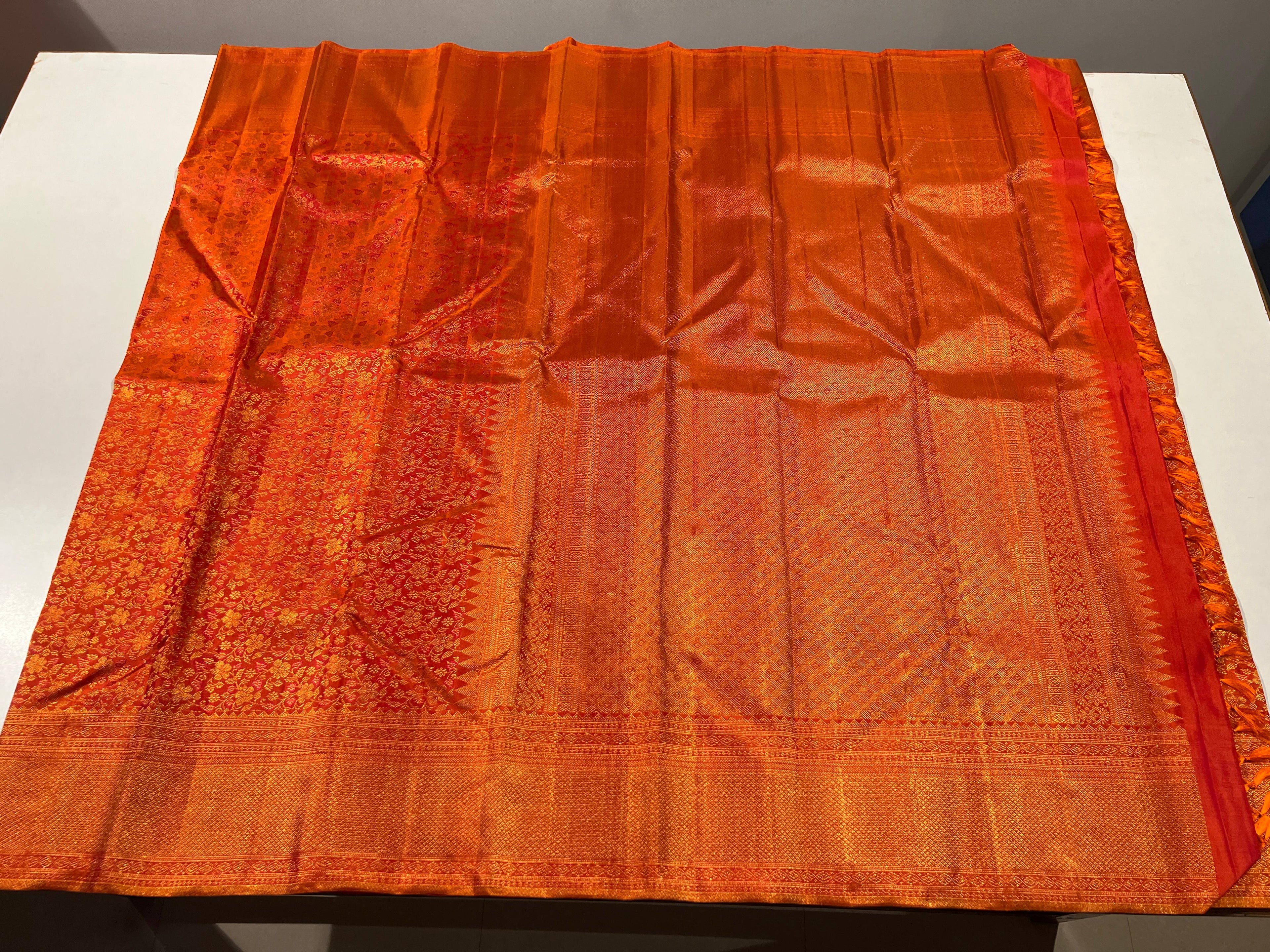 Pure Kanchipuram Handloom Silk Saree in Orange Colour.