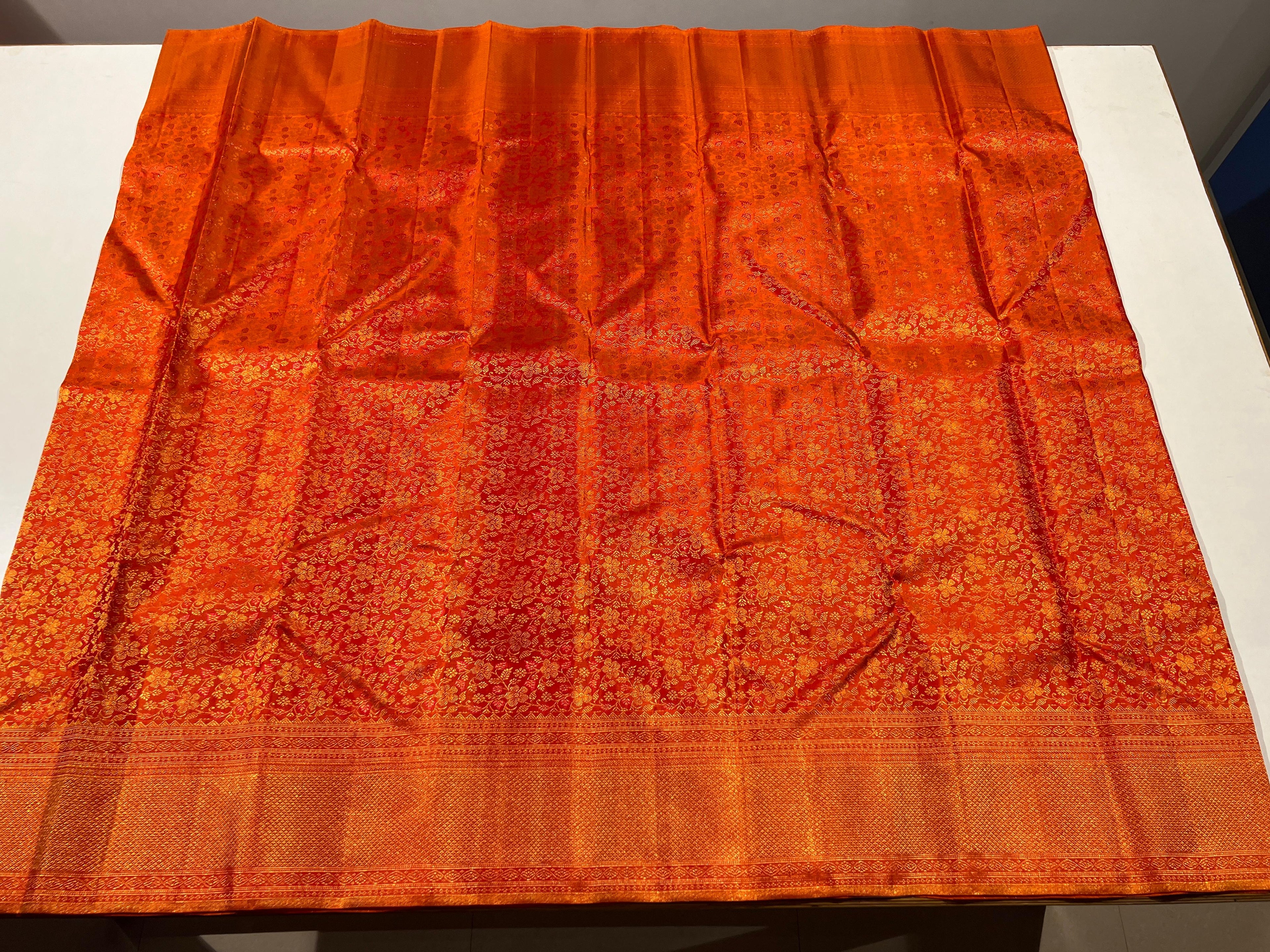 Pure Kanchipuram Handloom Silk Saree in Orange Colour.