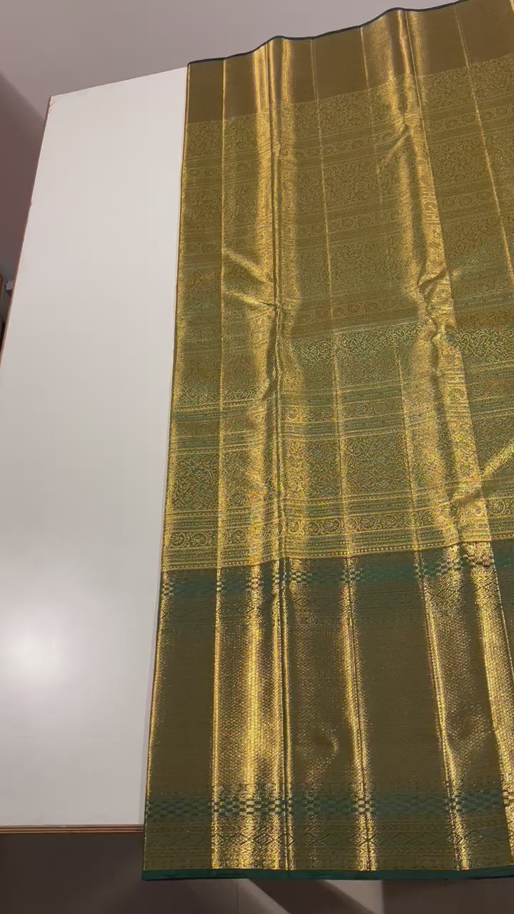 Pure Kanchipuram Handloom Tissue Silk Saree with Gold Zari.